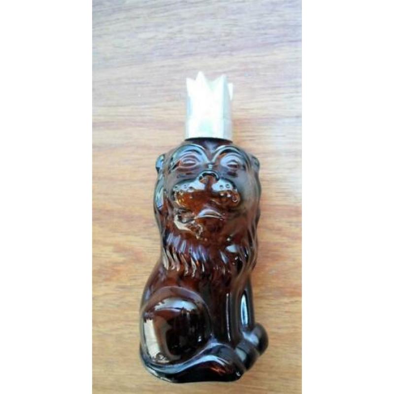 Aftershave fles in de vorm van een Leeuw. Moara Shira.