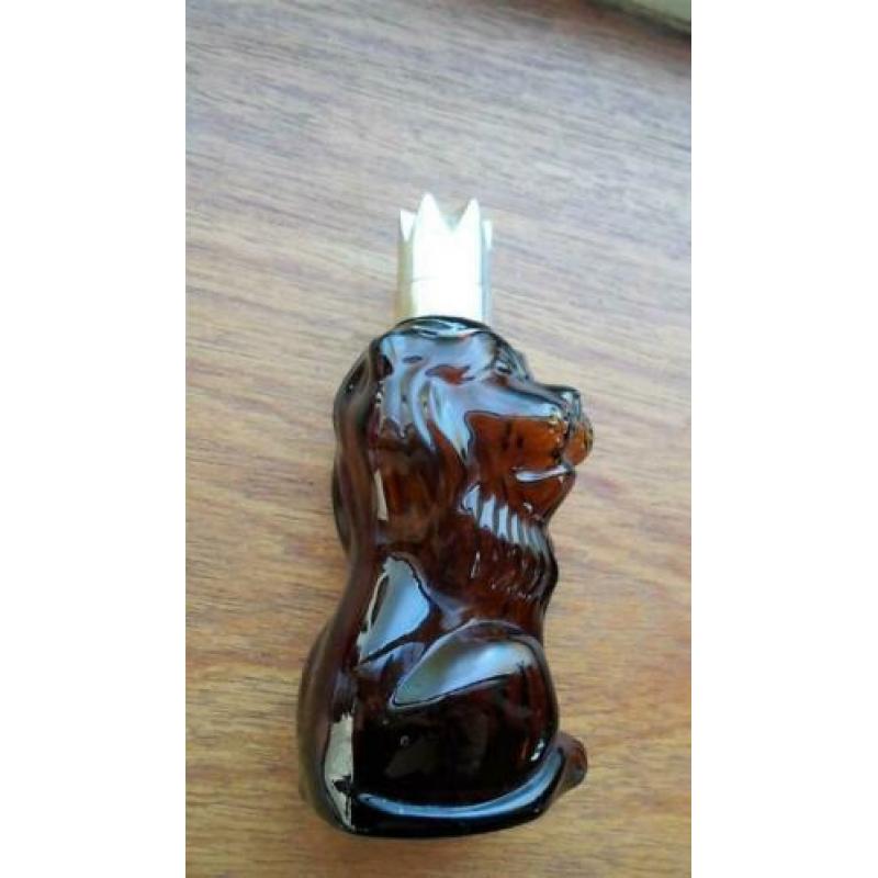 Aftershave fles in de vorm van een Leeuw. Moara Shira.