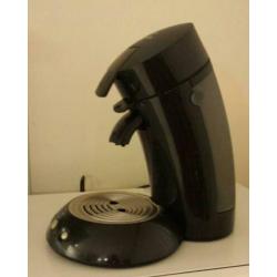 Philips Senseo apparaat met koffiepadhouder.