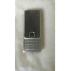 Originele NOKIA 6300 zilver/zwart met originele lader!