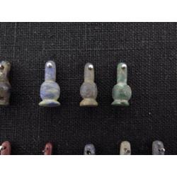 Collection of 27 Egyptian crystal poppy bead amulets