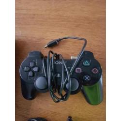 PS3 super slim (320gb) met controller - 14 games