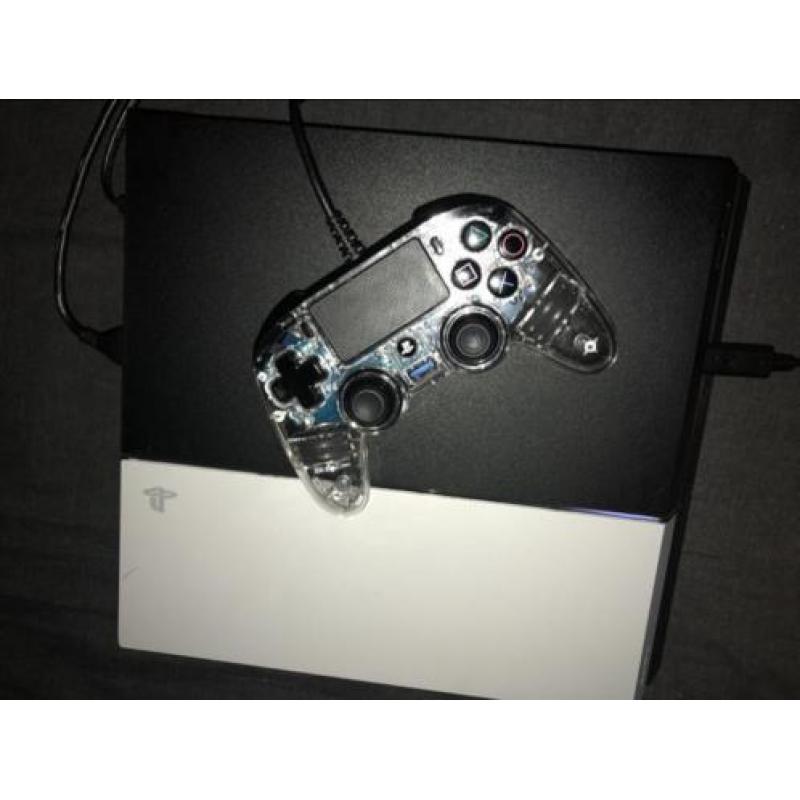 Playstation 4 te koop +games en controller